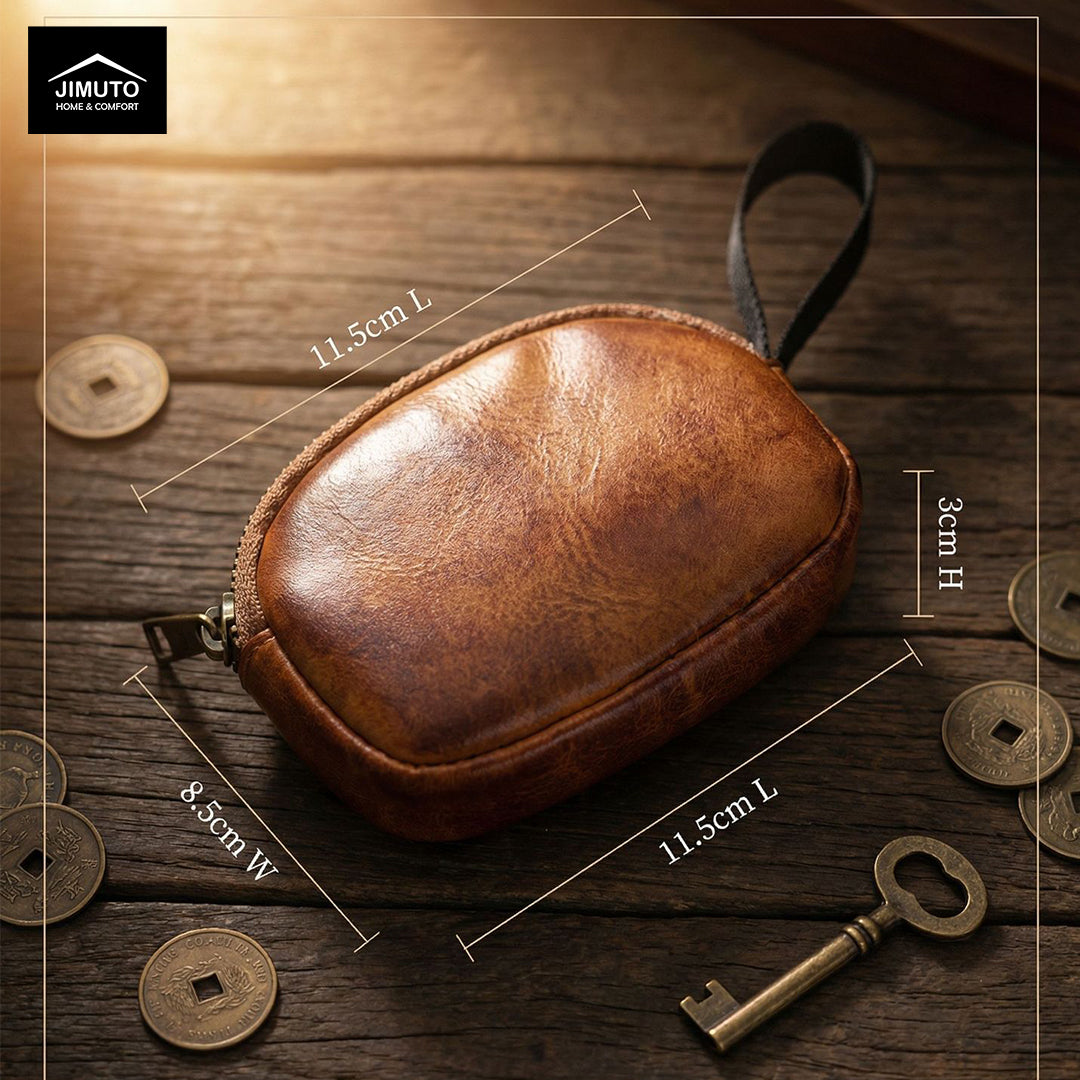 Brown leather pouch with dimensions on a wooden surface with coins and a key.