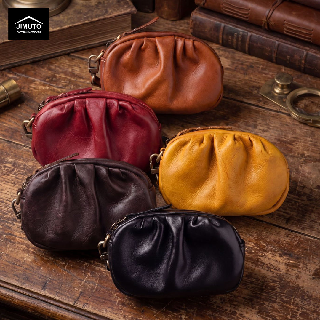 Five leather coin purses in different colors on a wooden surface with 'JIMUTO' branding.