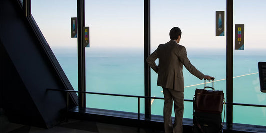 a business man travels at an airport