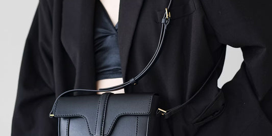 a fashion lady wearing a leather crossbody bag