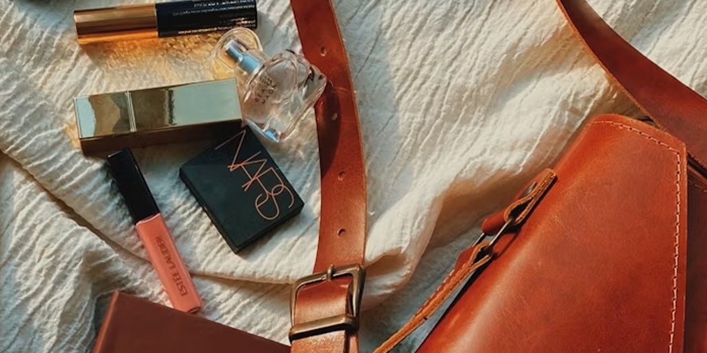 a leather bag and cosmetic bag