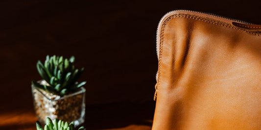 a leather pouch on a desk