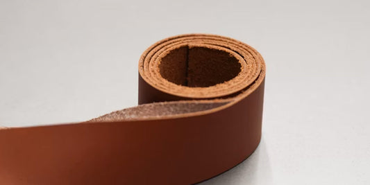 a roll of leather on a desk
