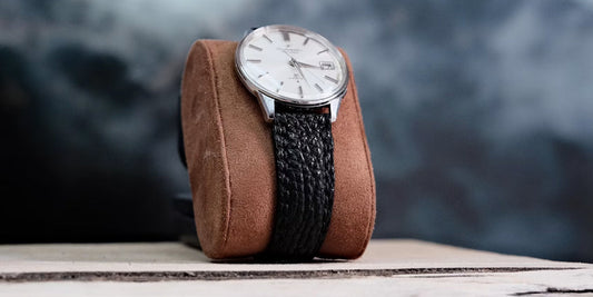 a watch installed too a watch case pillar