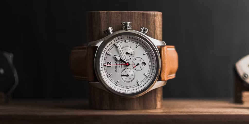 a watch set to a wood watch roll