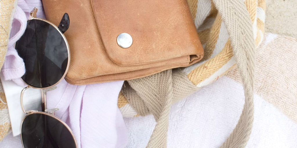 cozy life with sunglasses and leather clutch