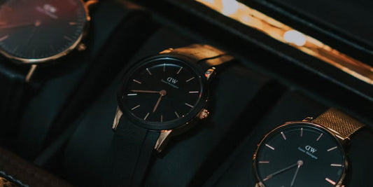 several watches in a watch storage case