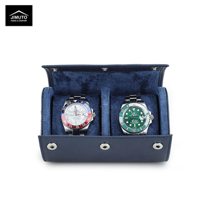 Two watches in a blue velvet display watch case with JIMUTO branding.