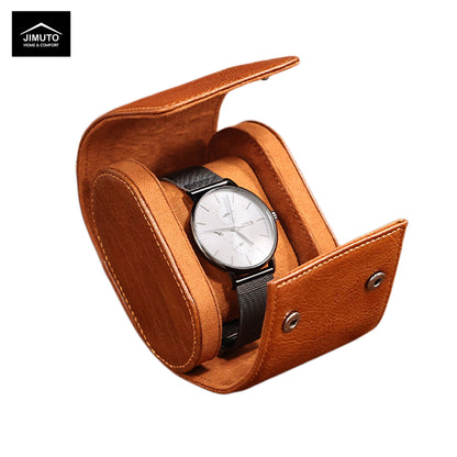 Brown leather watch case with a silver watch inside on a white background, featuring the JIMUTO brand.