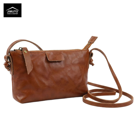 Brown leather crossbody bag on a white background with brnad 'JIMUTO' 