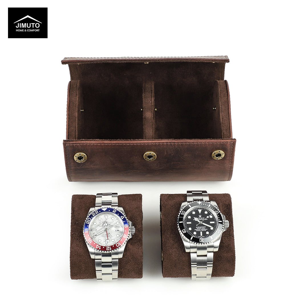 Two watches on brown velvet stands with a brown leather watch box in the background, featuring the JIMUTO brand.