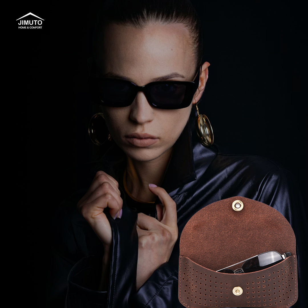 Woman wearing sunglasses with a brown leather sunglasses case.