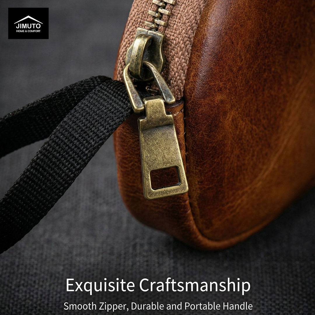 Brown leather pouch with gold zipper on a dark background, featuring Jimuto brand.