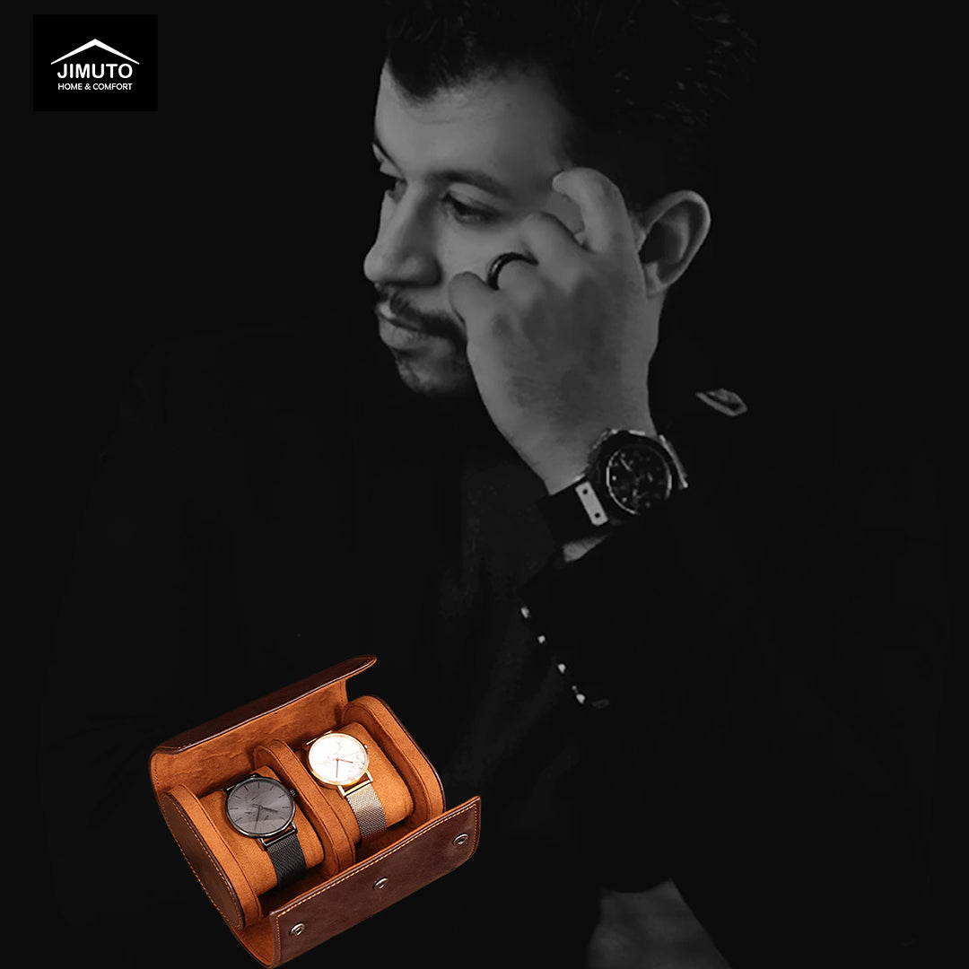 Man with a watch on his wrist looking at a display of watches in an open leather watch box.
