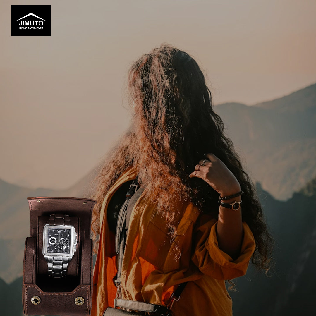 Person with long hair and a backpack standing on a mountain with a watch in the foreground.