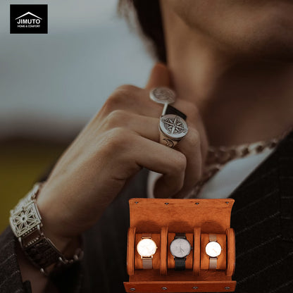 Man wearing a watch and ring with a leather display case of watches, featuring the JIMUTO brand.