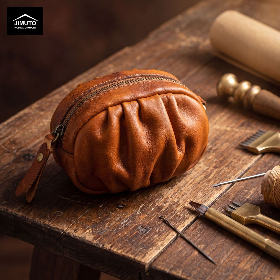 Brown leather pouch on a wooden surface with tools and materials.