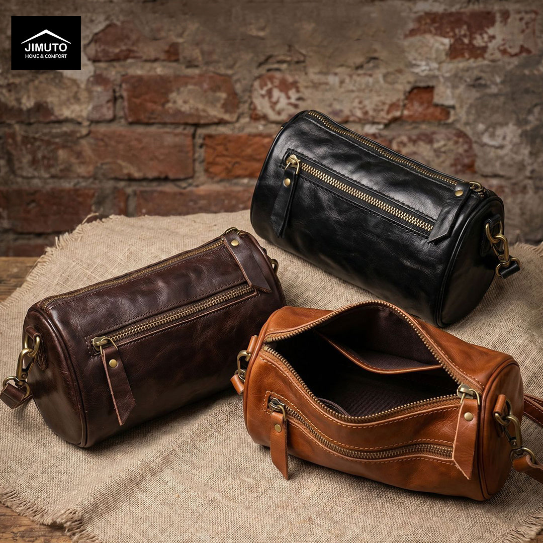 Three leather cosmetic and storage bags in brown and black on a textured surface with a brick wall background.