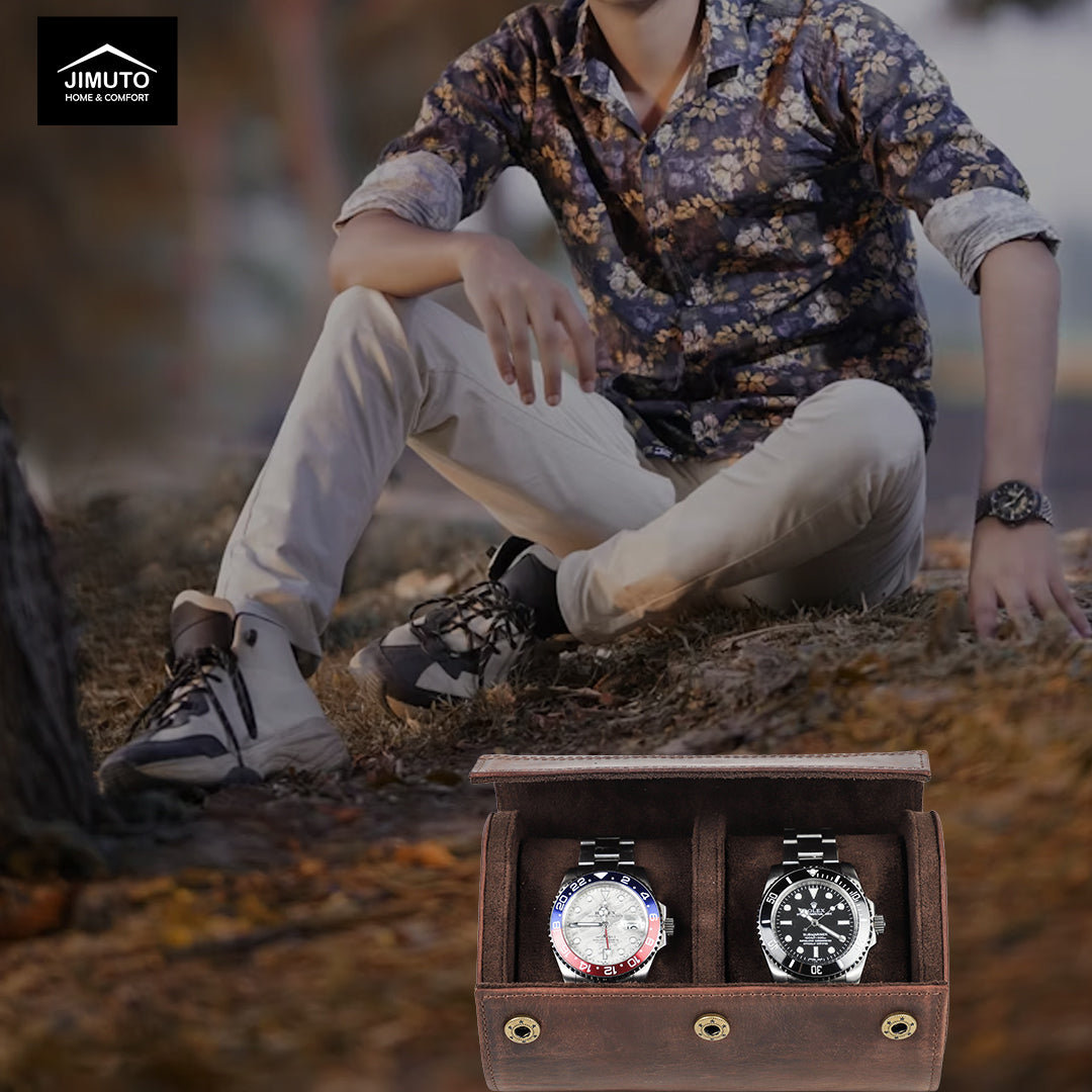 Person sitting outdoors with two watches in a leather watch case in the foreground