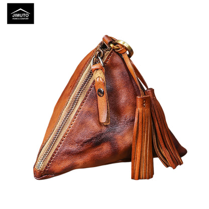 Brown leather handbag with tassel on a white background, featuring the Jimuto brand.