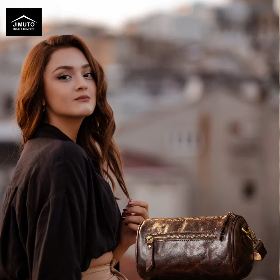 Woman holding a brown leather handbag with a blurred background