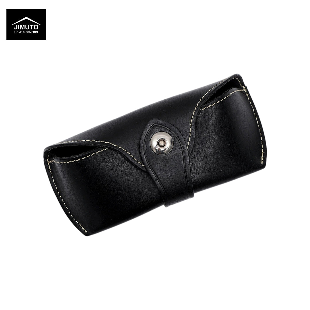 A black top-grain leather sunglasses case with white contrast stitching and a silver snap button closure, shown on a plain white background with a Jimuto logo in the top-left corner.