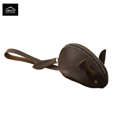 A dark brown leather coin pouch with a zipper closure and a matching leather strap, shown on a plain white background with a JIMUTO logo in the top-left corner.