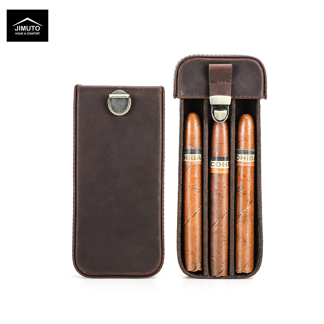 A dark brown leather cigar case shown open and closed on a white background. The open case contains three cigars, and a Jimuto brand logo is visible in the top-left corner.