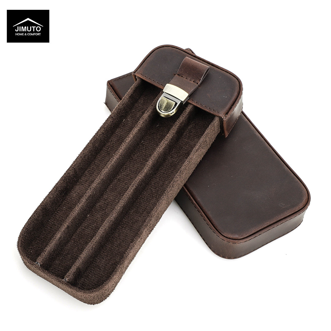 A dark brown leather cigar case shown open with its lid placed behind it on a white background. The open case reveals three parallel interior slots lined with dark brown velvet.