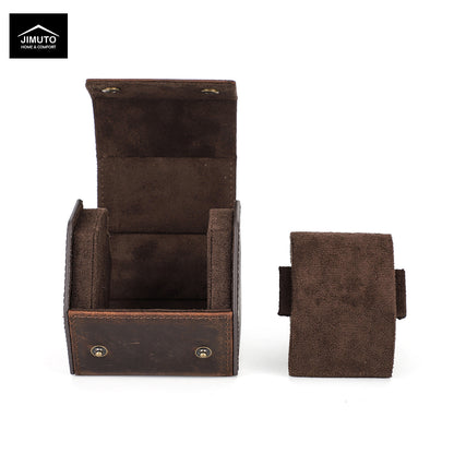 A dark brown hexagonal leather watch box shown open with its interior compartments visible, alongside the matching closed exterior pouch on a white background. A Jimuto brand logo is visible in the top-left corner.