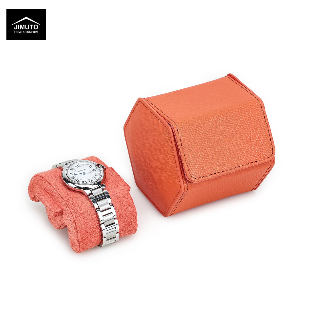 An orange watch cushion set on a white background, featuring one cushion holding a silver metal bracelet watch and another cushion shown open. A Jimuto logo is visible in the top-left corner.
