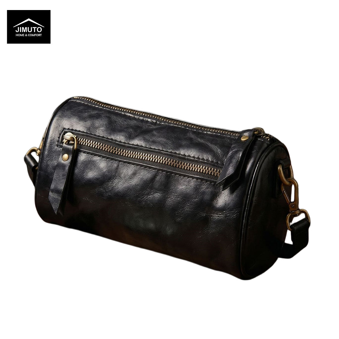 Black leather cosmetic and storage bag with gold zipper and strap on a white background, featuring the JIMUTO brand.