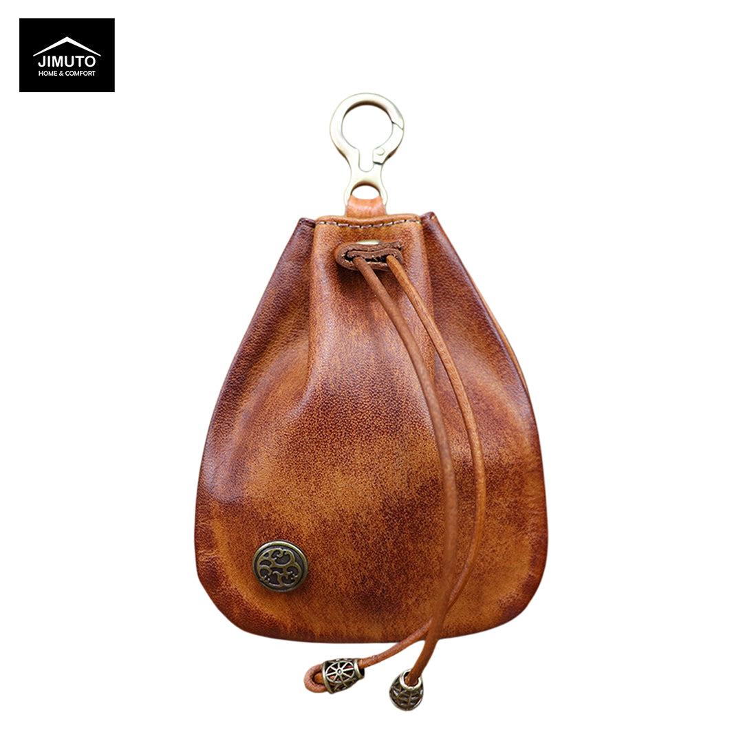 Brown leather drawstring bag with decorative elements on a white background, featuring the JIMUTO brand.