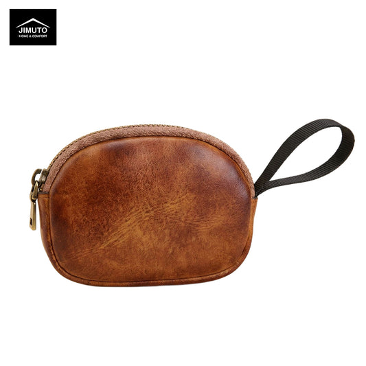 Brown leather pouch with a strap on a white background, featuring the Jimuto brand.