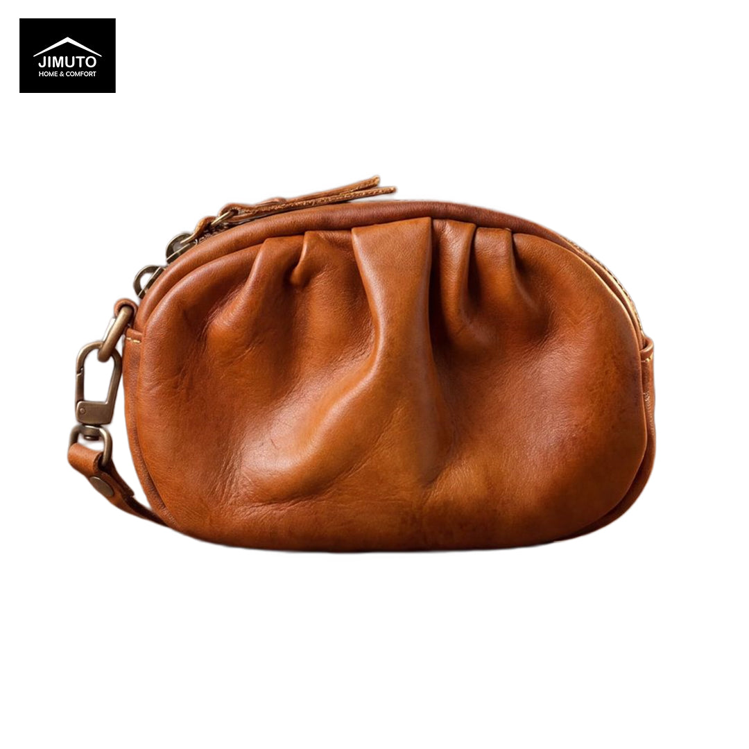 Brown leather clutch bag with a chain strap on a white background, featuring the JIMUTO brand.