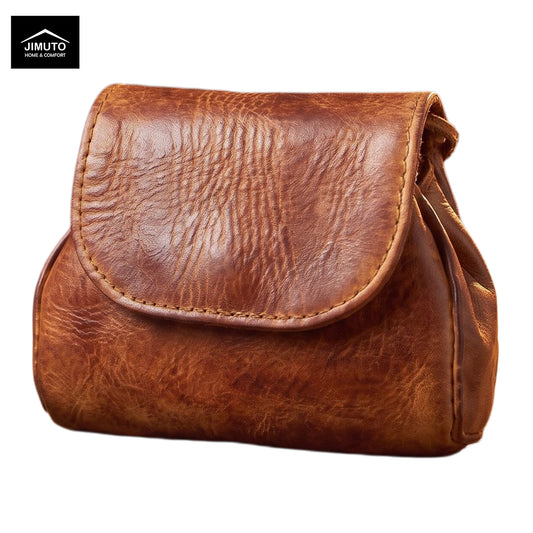 A brown distressed leather pouch with a curved flap and visible stitching, shown on a plain white background. A black 'JIMUTO' brand logo is visible in the top-left corner.