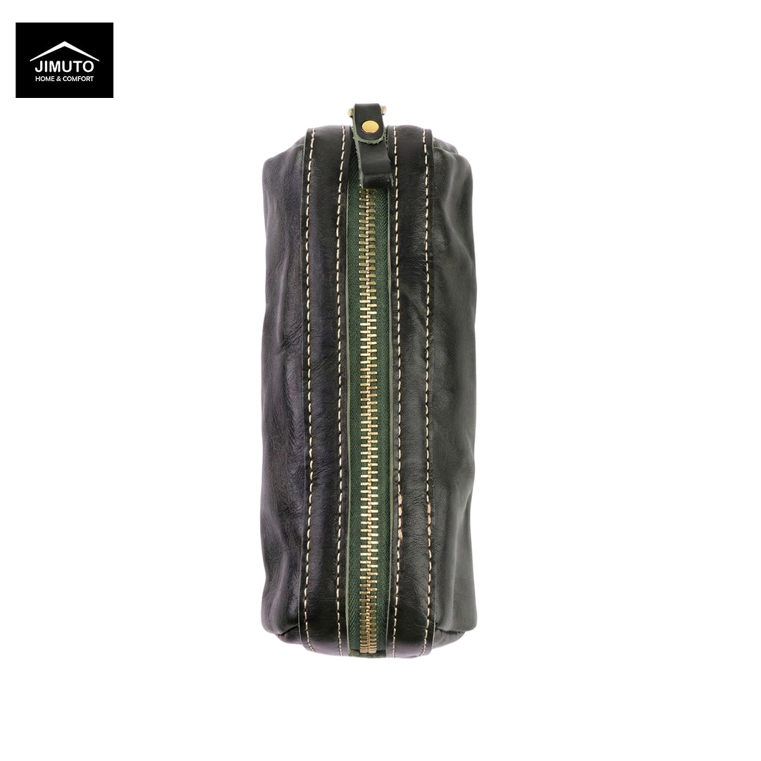 A green leather zippered pen pouch with gold-toned hardware and contrast stitching, shown against a plain white background with a Jimuto logo in the top-left corner.
