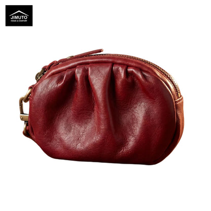 Red leather pouch with gold zipper on a white background, featuring the JIMUTO brand.
